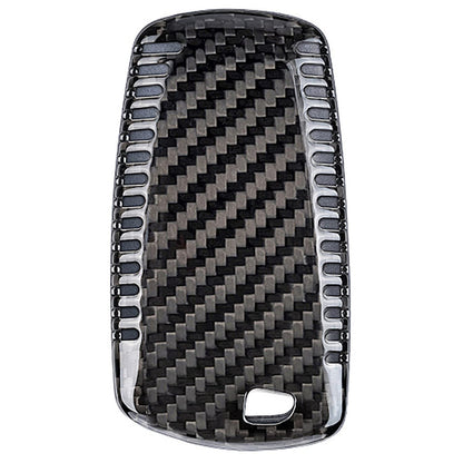 BMW 1-7 Series carbon fiber key cover by Palenon Performance, showcasing a sleek, textured automotive accessory for key protection.