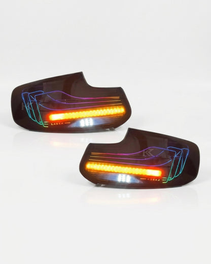 BMW 2 Series F22/F87 CSL RGB LED tail light assembly with turn signal, black housing, for 2014-2021 models by K2 Industries