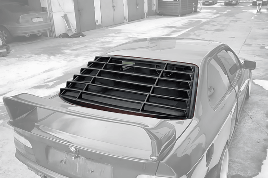Black K2 Industries windshield louvers installed on a BMW E36 Coupe Series 3, 1992-1999, showcasing their sleek design and fit.
