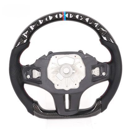 Vekto M Sport carbon fiber steering wheel for BMW G Series, close-up view showing textured carbon fiber finish and ergonomic grip.