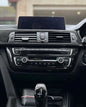 BMW 3 Series F30 carbon fiber radio cover trim by K2 Industries, showcasing sleek interior interior upgrade for models 2011-2019.
