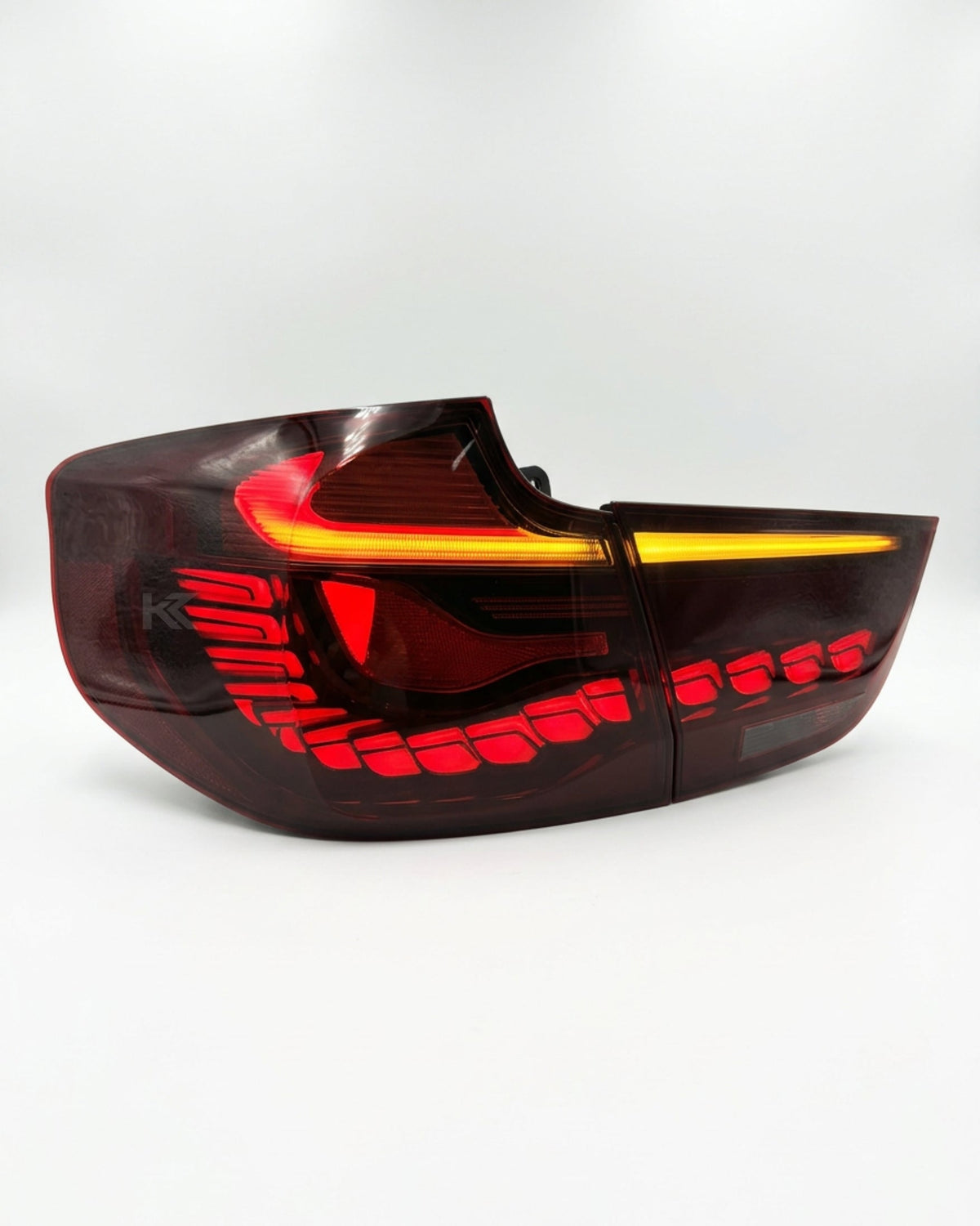 BMW 3-Series F34 Gran Turismo (GT) tail lights in red and smoke GTS OLED style, installed on a 2012-2016 model.
