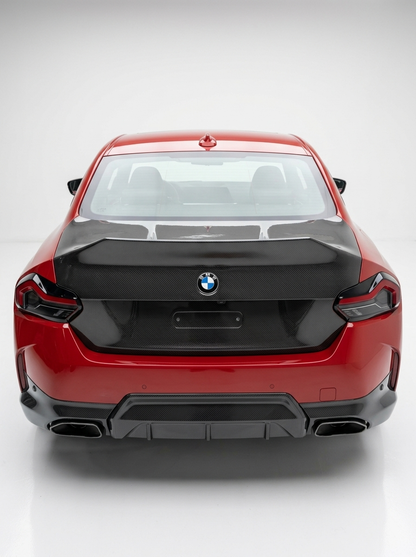 BMW 2 Series G42 M240i CSL dry carbon fiber trunk by K2 Industries, showcasing sleek, lightweight carbon fiber with aerodynamic design.