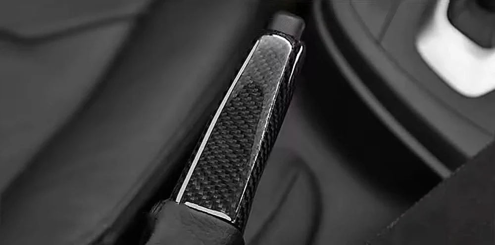BMW carbon fiber handbrake lever cover by K2 Industries, showcasing a sleek, lightweight hand brake lever upgrade in carbon fiber finish.