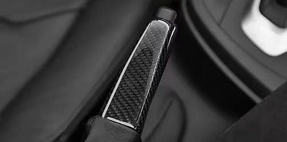 BMW carbon fiber handbrake lever cover by K2 Industries, showcasing a sleek, lightweight hand brake lever upgrade in carbon fiber finish.