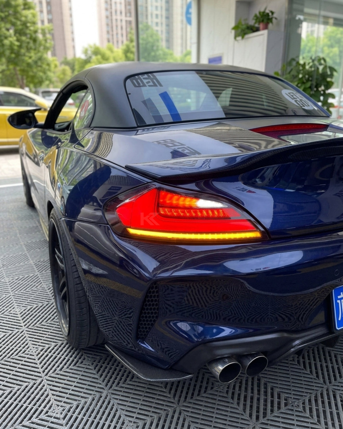 BMW Z4 E89 tail lights upgrade by K2 Industries, featuring clear and red LED tail lights installed on a 2008-2016 model.