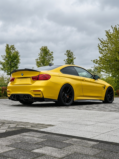 BMW 4 Series F82 M4 PSM style carbon fiber trunk spoiler by K2 Industries, showing sleek aerodynamic design on a 2014-2020 model.