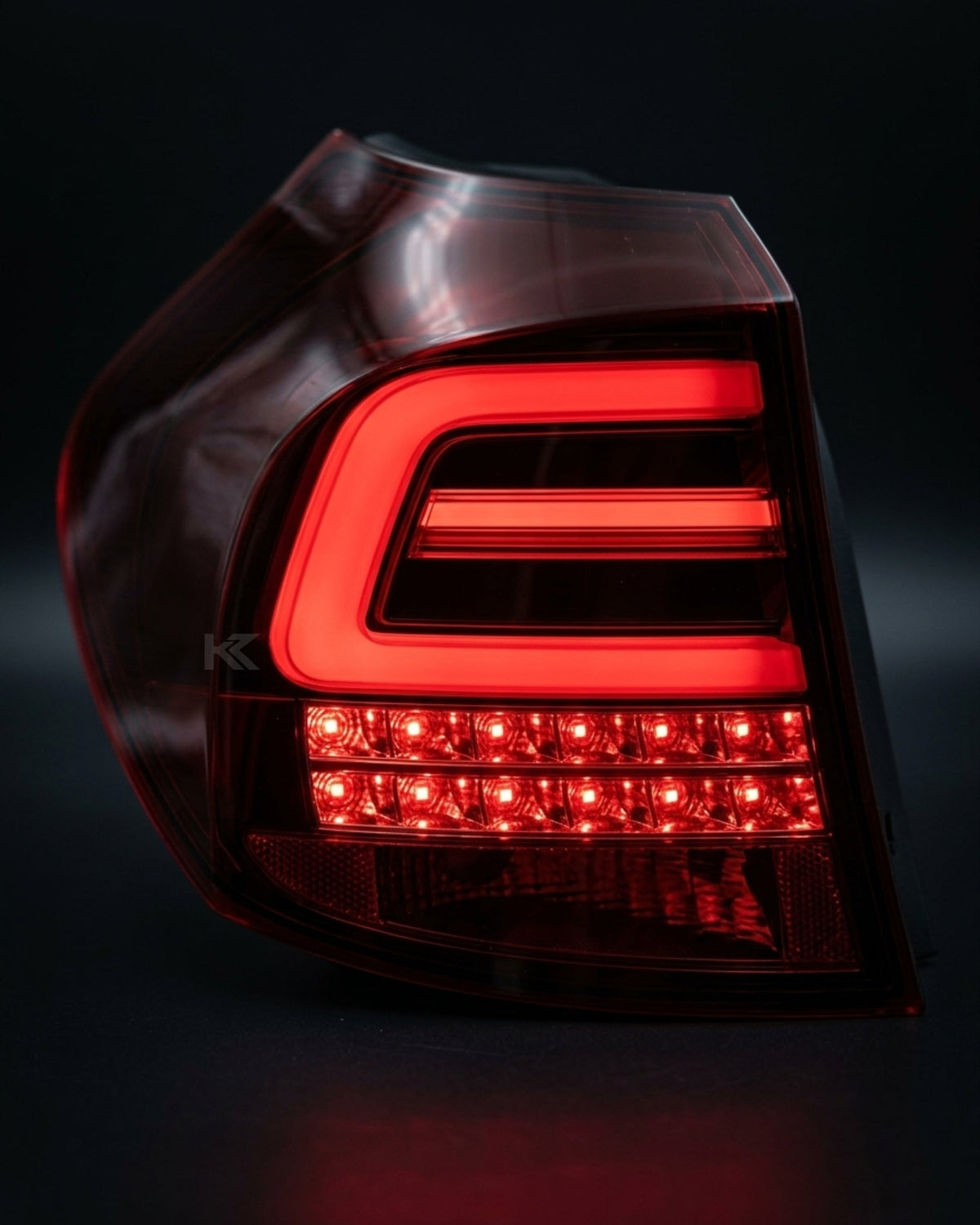 BMW 1 Series E87 E81 120i 130i LED tail light upgrade by K2 Industries, showing sleek, modern tail light design on a 2005-2011 model.
