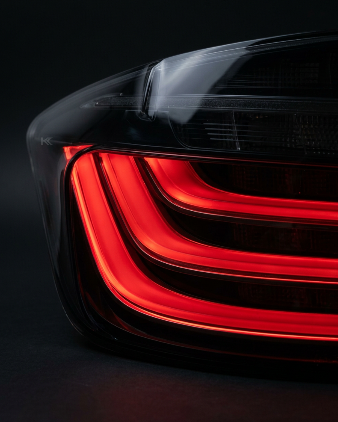 BMW 5 Series F10 BlackLine Style LED tail lights by K2 Industries, featuring sleek black housing and bright LED illumination.