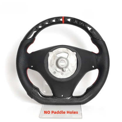 Vekto real carbon fiber steering wheel for BMW E90 E92 E93 M3 328i 335i 135i 2009-2013, close-up view of the sporty wheel