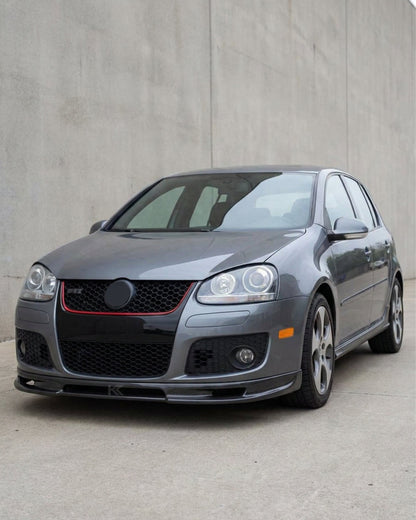 Volkswagen Golf GTI MK5 front bumper splitter in carbon fiber by K2 Industries, showing the sleek A Style design on the front lip.