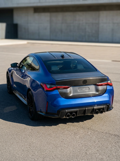 BMW 4 Series G82 M4 OEM Style carbon fiber trunk by K2 Industries, showcasing sleek carbon fiber finish and aerodynamic design.