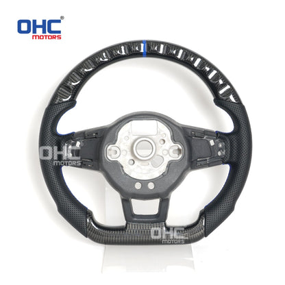Vekto carbon fiber steering wheel for VW Golf 7 GTI R Mk7, close-up view showing textured carbon fiber surface and ergonomic design