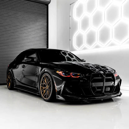 Carbon fiber kidney grille for BMW G80 M3 and G82 M4, CSL style, by Palenon Performance, showcasing sleek, textured design.