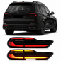 BMW X7 G07 LED tail lights assembly with dynamic turn signal by Vekto, showing sleek design and illuminated signals.
