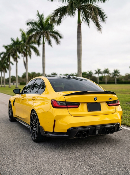BMW 3 Series G20 G28 G80 M3 carbon fiber trunk spoiler by K2 Industries, showcasing sleek aerodynamic design and carbon fiber finish.