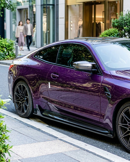 BMW M4 G82 G83 side skirt extensions in pre-preg dry carbon fiber, designed for sleek, aerodynamic enhancement by K2 Industries.