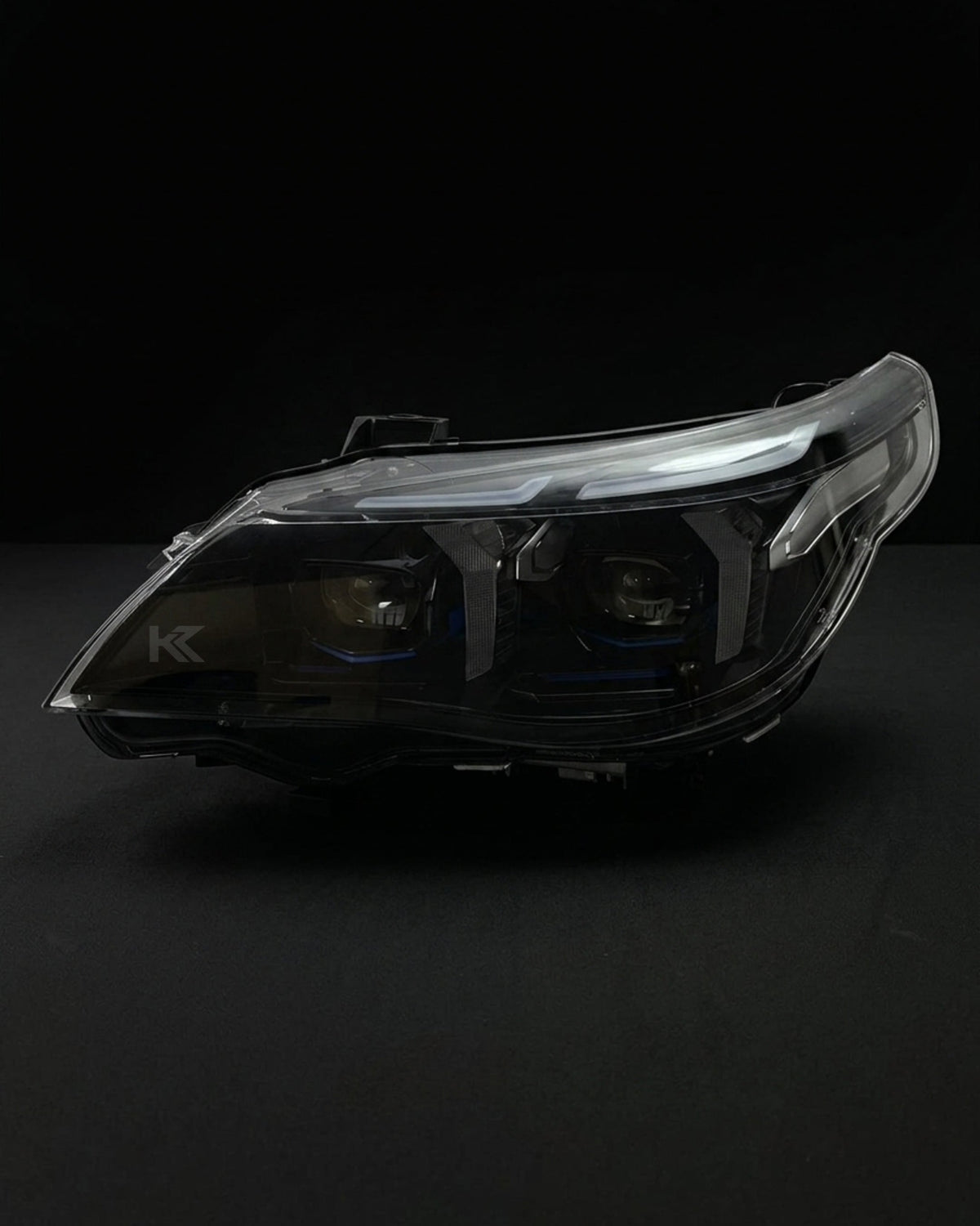 BMW 5 Series E60 Snake Eye LED headlight assembly with dual-color daytime running lights, designed by K2 Industries for 2003-2010 models.