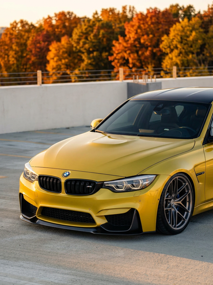 BMW 3 Series F80 M3 F82 F83 M4 CS style carbon fiber front lip by K2 Industries, shown installed on the front bumper.