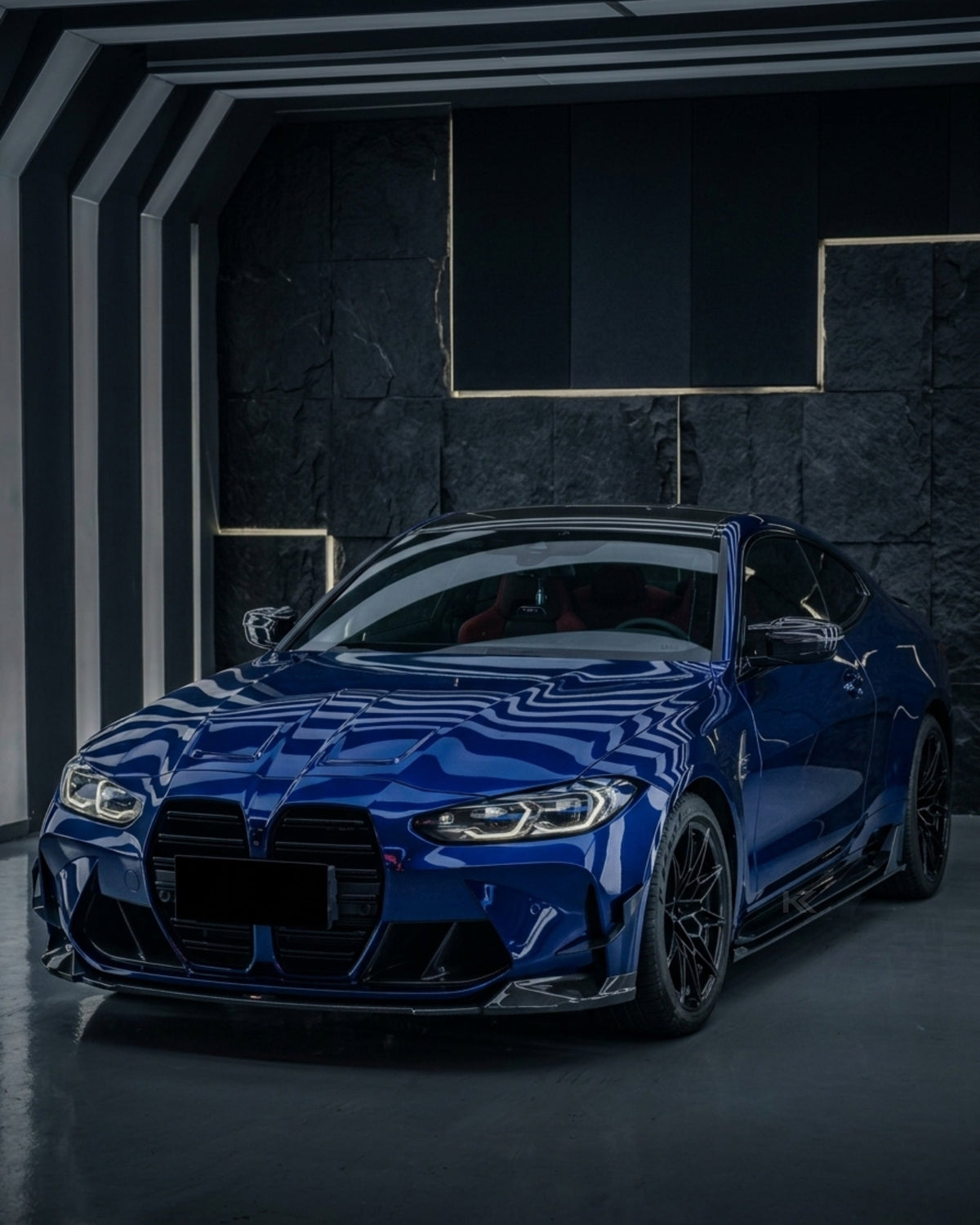 BMW M3 G80 and M4 G82 carbon fiber side skirt extensions by K2 Industries, showcasing sleek pre-preg dry carbon fiber finish.