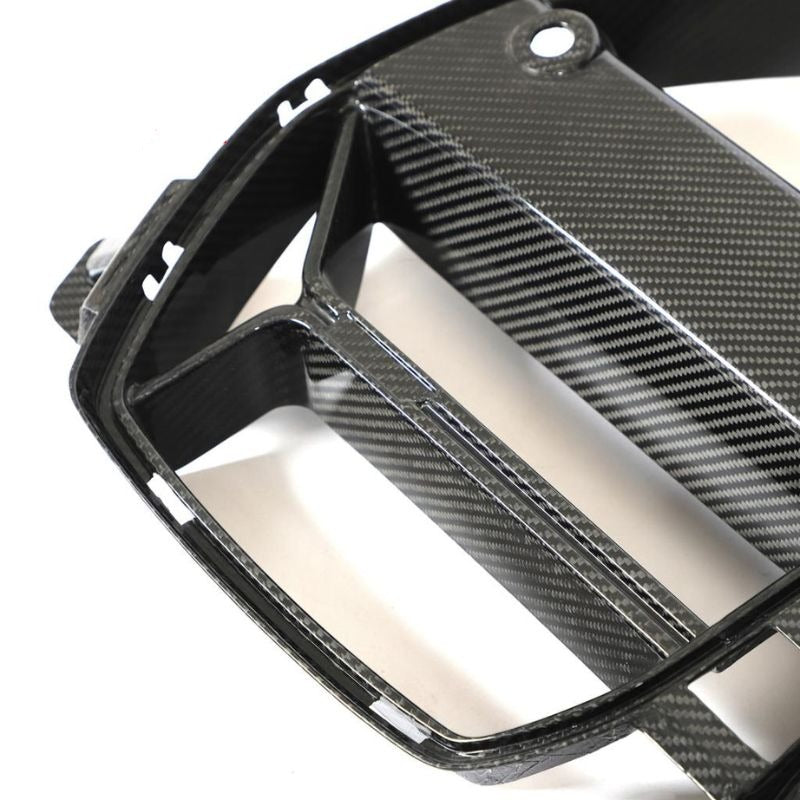 Carbon fiber kidney grille for BMW G80 M3 & G82/G83 M4, CSL style, by Palenon Performance, featuring sleek design and high-quality finish.