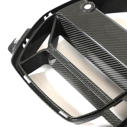 Carbon fiber kidney grille for BMW G80 M3 & G82/G83 M4, CSL style, by Palenon Performance, featuring sleek design and high-quality finish.