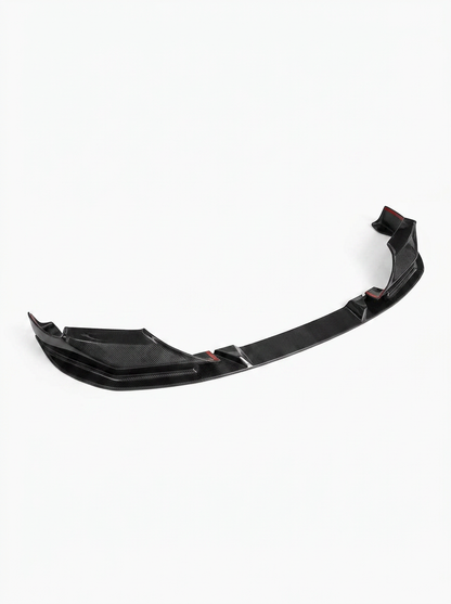 BMW 5 Series F90 M5 3D Style carbon fiber front lip by K2 Industries, showing the sleek textured design on the vehicle's front bumper.
