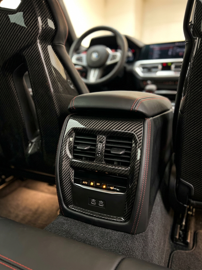 BMW 3 Series G80 G82 M3 M4 carbon fiber interior rear console trim by K2 Industries, showcasing sleek textured finish.