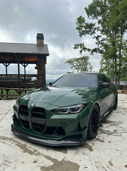K2 Industries BMW 3 Series M3 G80 M4 G82 CSL style carbon fiber front grille with mesh design for 2021-2023 models.