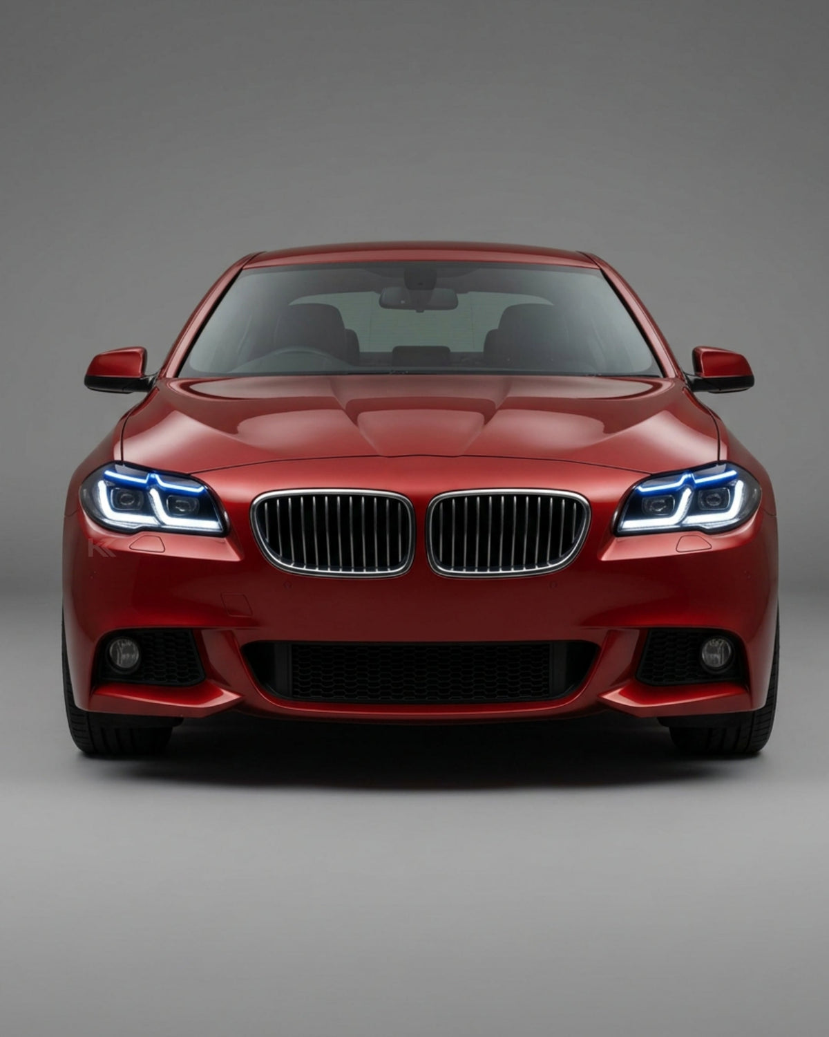 BMW 5-Series F10/F18 headlights with G30 style by K2 Industries, showcasing the modern headlight design and LED elements.