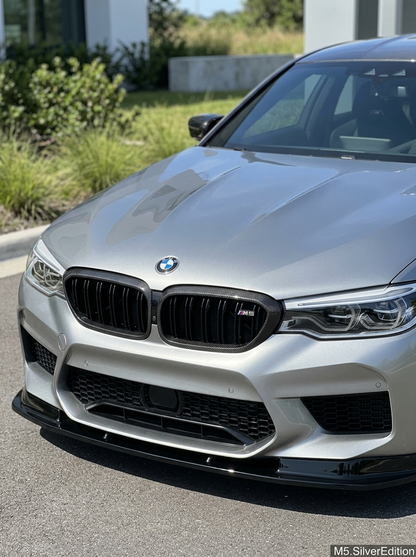 BMW 5 Series G30 carbon fiber front grille by K2 Industries, showcasing sleek, lightweight design with textured carbon fiber finish.