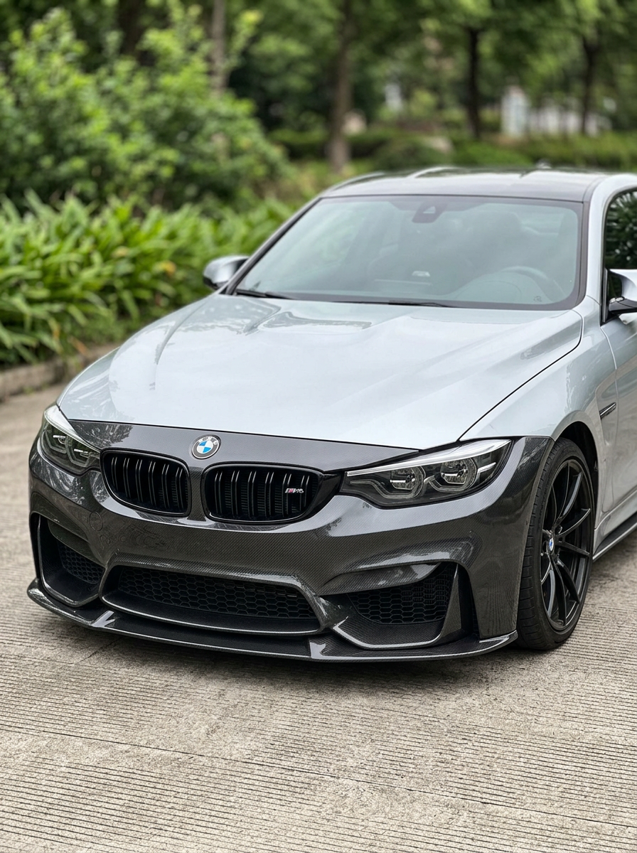 BMW 3 Series F80 F82 F83 carbon fiber front bumper by K2 Industries, showing the sleek, aerodynamic design with carbon fiber finish.