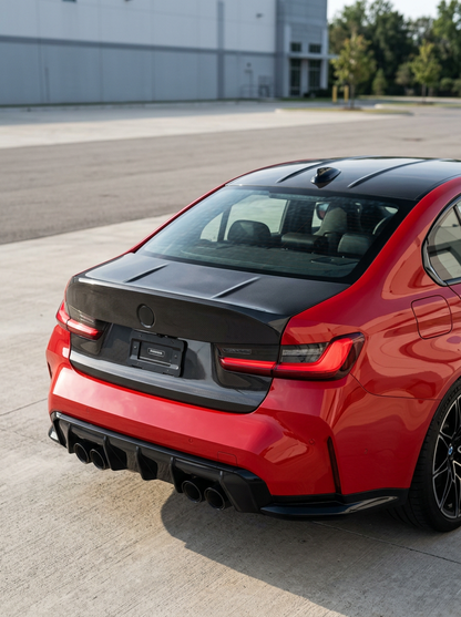 BMW 3 Series G80 M3 CSL style carbon fiber trunk by K2 Industries, showcasing lightweight, textured carbon fiber exterior.