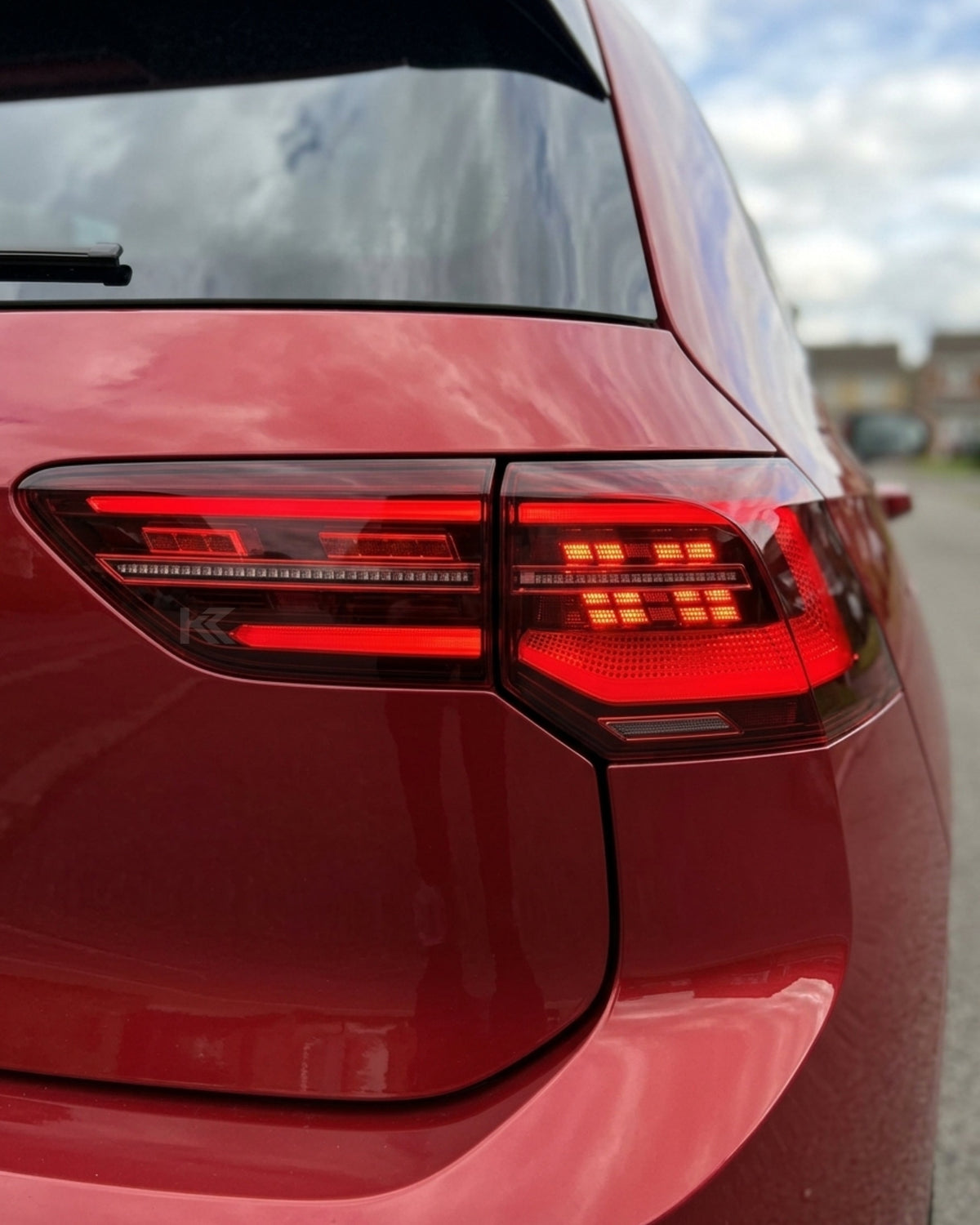 Volkswagen Golf 8 European Style LED tail lights by K2 Industries, showing sleek design and bright illumination for model years 2020-2023.