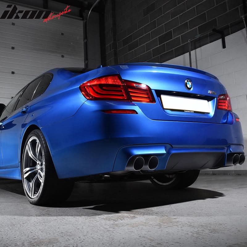 BMW F10 M5 front bumper with foglights and cover, along with rear bumper, by K2 Industries, showing close-up of bumper details.