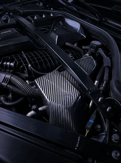 BMW 3/4 Series G80/G81/G82 G83 G87 carbon fiber ECU cover by K2 Industries, sleek black textured finish, fits 2021+ models.