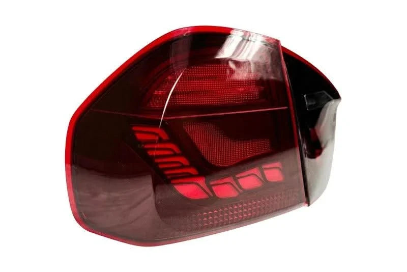 BMW 3 Series E90 M3 GTS OLED tail lights by K2 Industries showing sleek, red and clear LED tail light design for 2006-2011 models.
