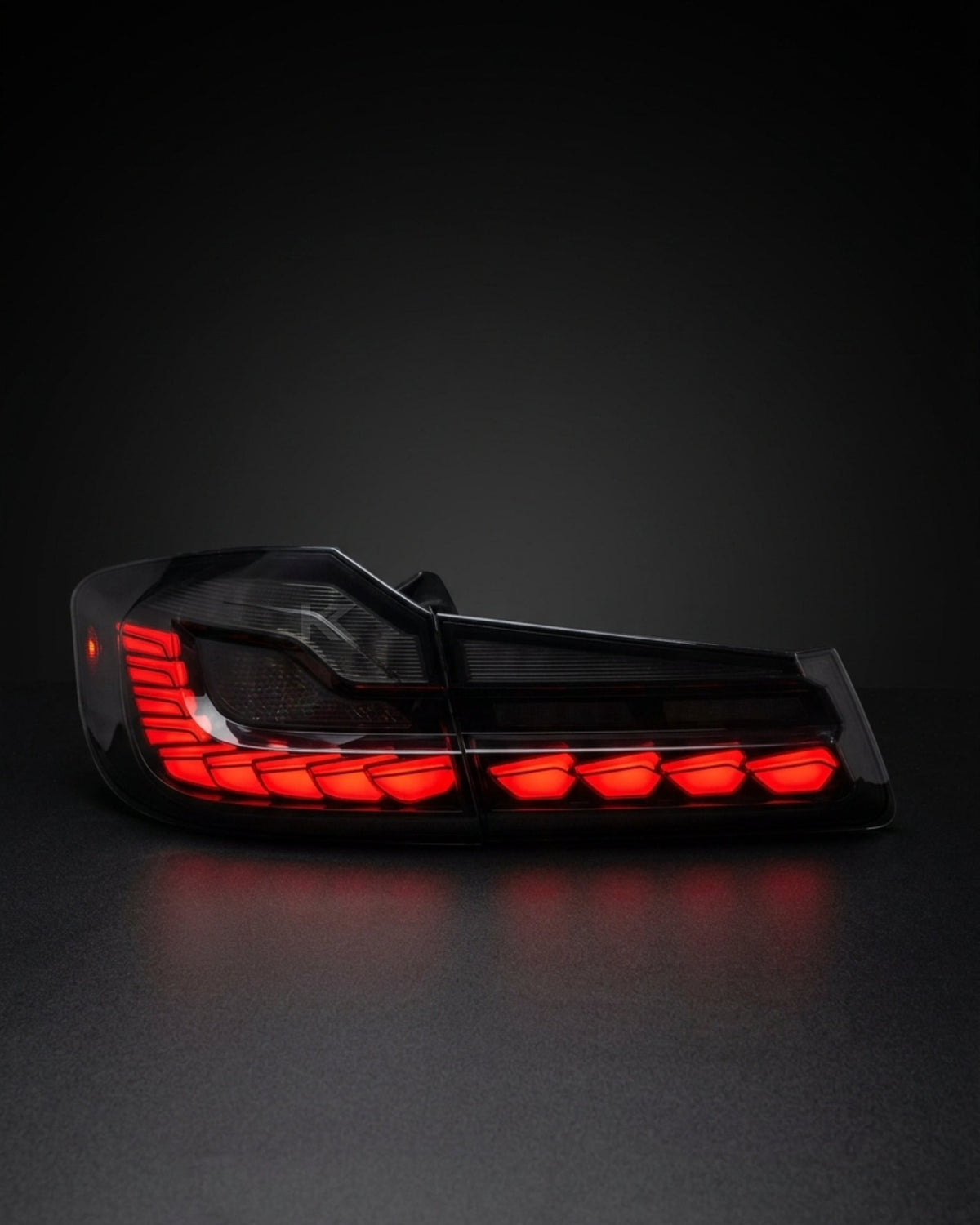 BMW 5-Series G30 G38 LED flow tail lights by K2 Industries, showing sleek red and clear lens design for 2018-2020 models.