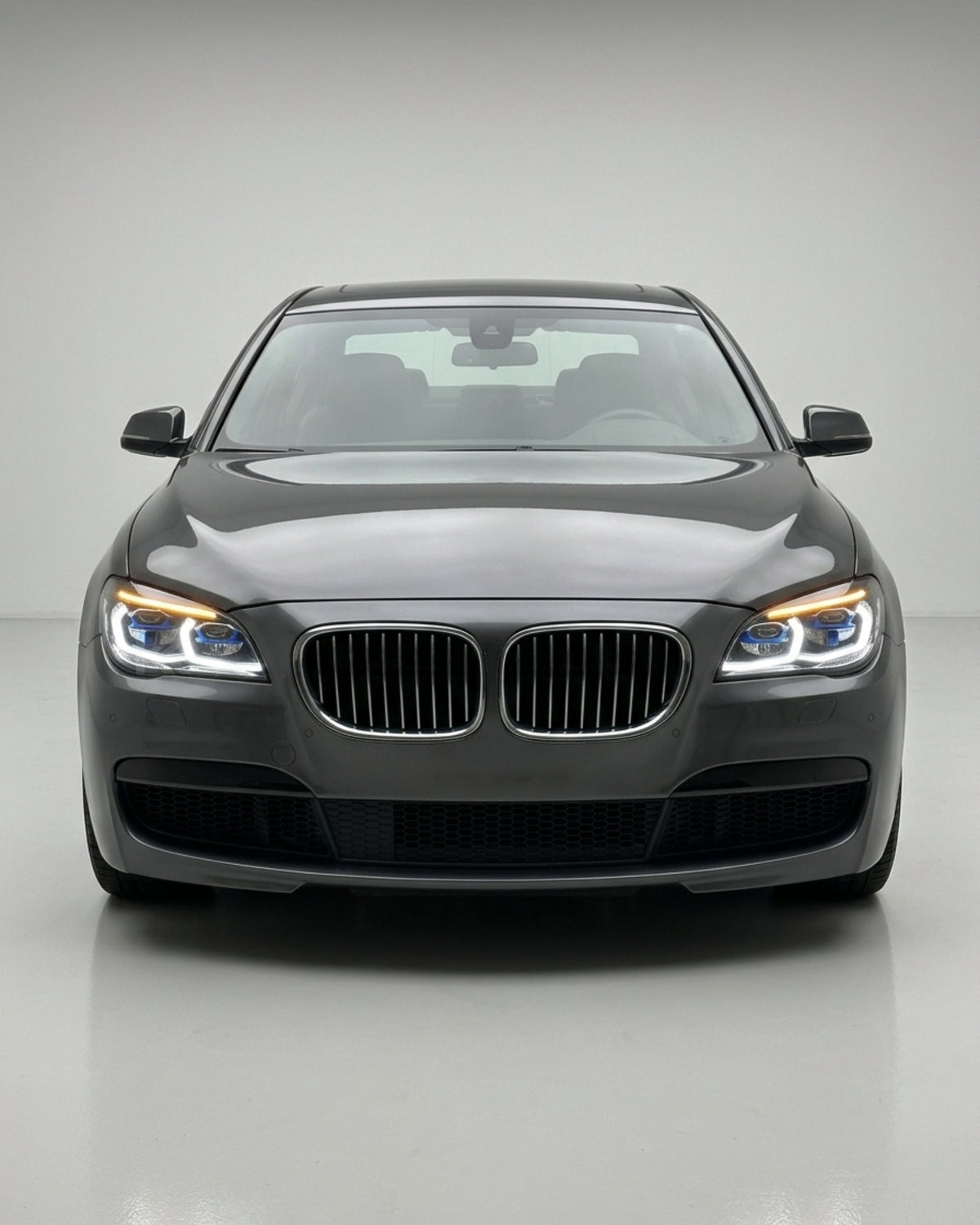 BMW 7 Series F02 G12 style LED headlight assembly with dual-color yellow and white DRL, for 2013-2015 models, by K2 Industries.