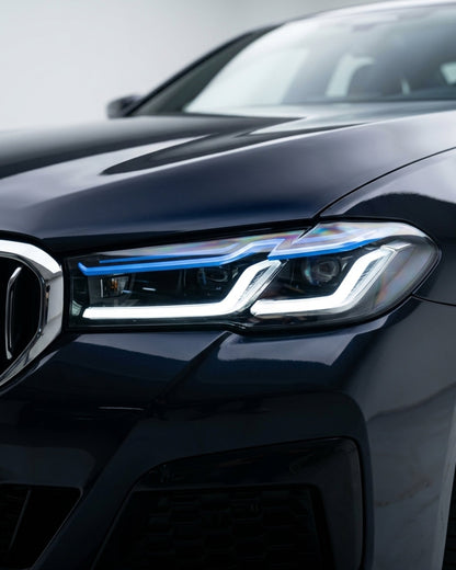 BMW 5-Series G38 G30 Laser LED headlights by K2 Industries, featuring sleek design and bright illumination in a close-up view.