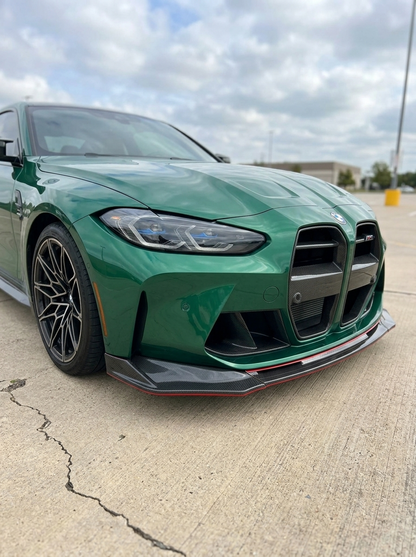BMW 3 Series M3 M4 G80 G82 carbon fiber front lip by K2 Industries, showcasing the sleek V style design on a 2019+ model.