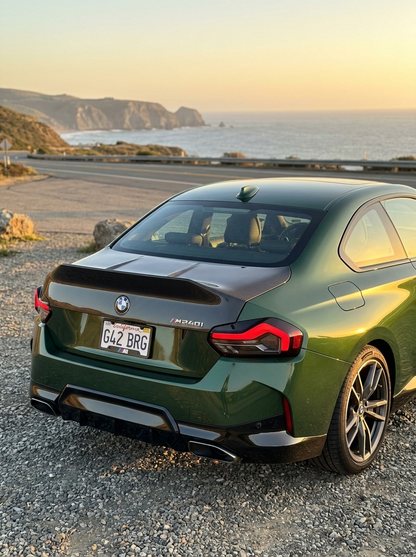 BMW 2 Series G42 M240i CSL dry carbon fiber trunk by K2 Industries, showing sleek, lightweight carbon fiber surface and aerodynamic design.