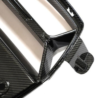 Carbon fiber kidney grille for BMW G80 M3 and G82/G83 M4 by Palenon Performance, showcasing sleek, lightweight design.