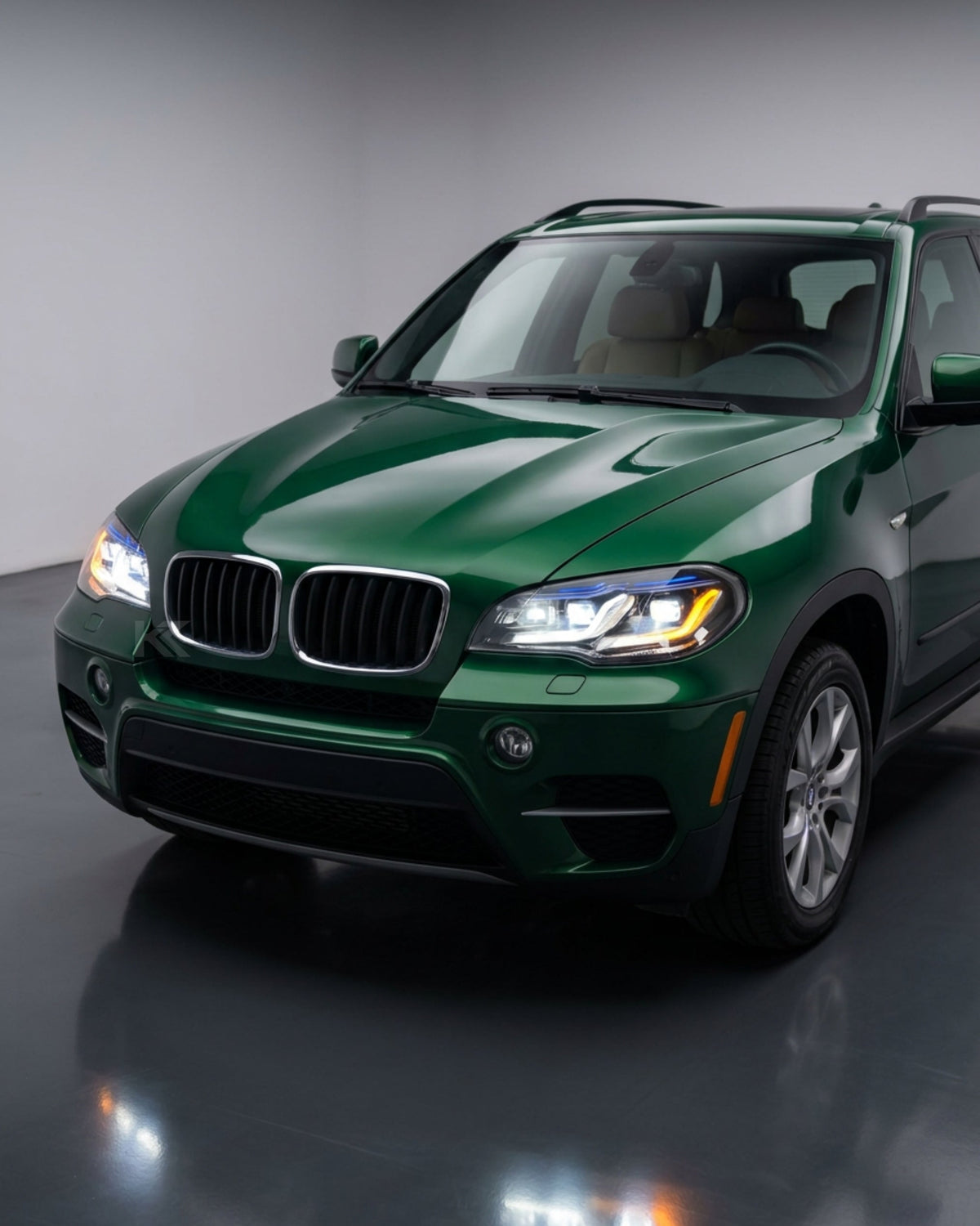 BMW X5 E70 LED headlights upgrade by K2 Industries, showing a close-up of modern, bright LED headlight units for 2007-2013 models.