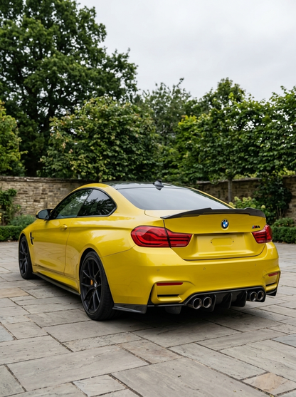 BMW 4 Series F82 M4 carbon fiber trunk spoiler by K2 Industries, featuring aerodynamic design and glossy finish.