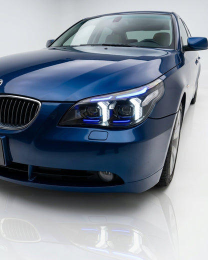 BMW 5 Series E60 Snake Eye LED headlight assembly with dual-color DRL from K2 Industries, showing the LED design and headlight housing.