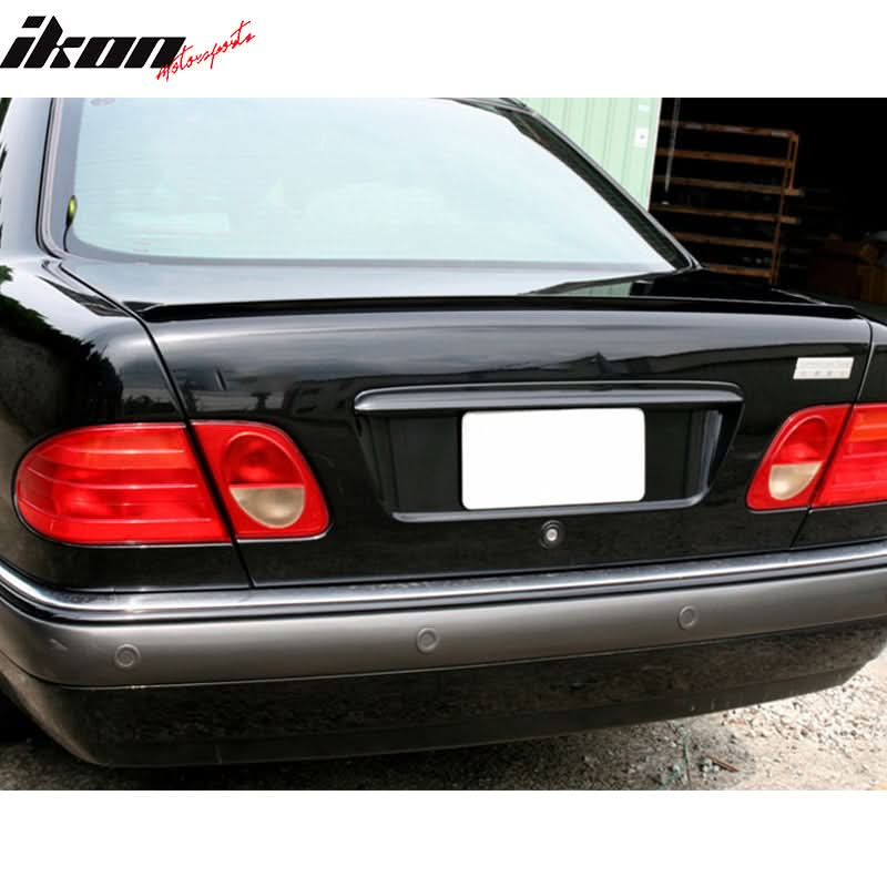 Black PV style trunk spoiler for BMW E90 sedan, 2006-2011, by K2 Industries, enhances aerodynamics and sporty look.
