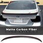 BMW E90 3 Series 4-door trunk spoiler in carbon fiber with red line style by K2 Industries, sleek aerodynamic design.