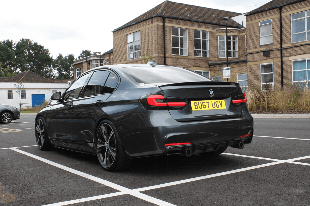 BMW 3 Series F30 F35 F80 LED tail light upgrade by K2 Industries, modern black line design, installed on vehicle for a sleek look.