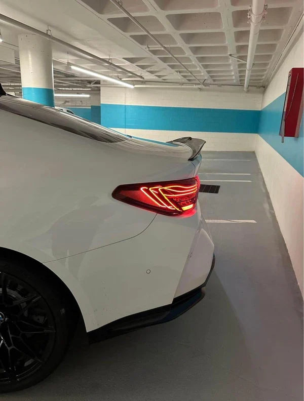 Vekto CSL laser tail lights installed on a BMW G22 4 Series and G82 M4, showcasing sleek LED design and modern lighting features.